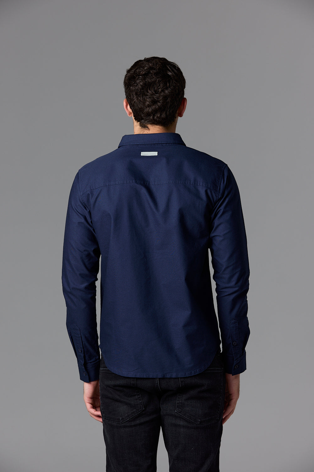 Blue button-down shirt on model, SOW_2_ECOM_WEB_102