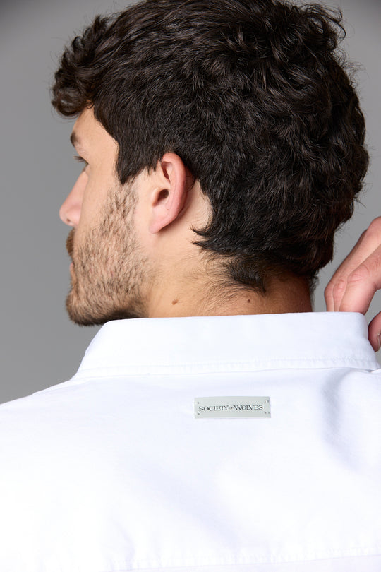 Man in white shirt from behind