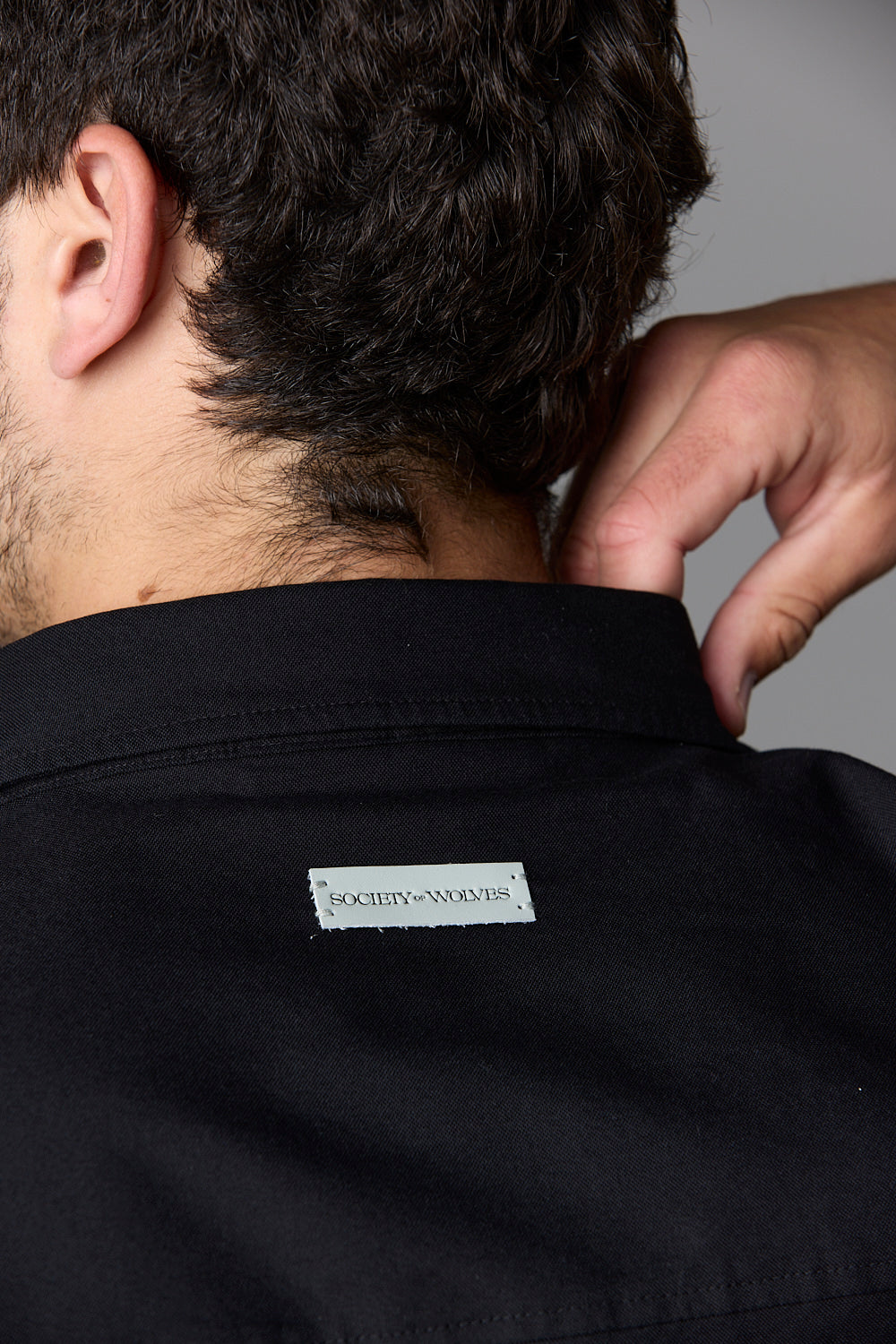 Society of Wolves black shirt collar