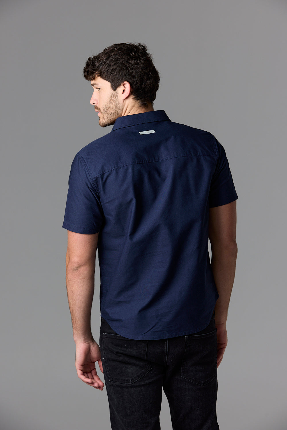 Man wearing navy short sleeve shirt - SOW_2_ECOM_WEB_27
