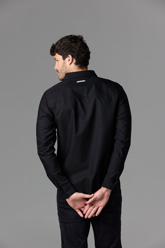 Man in black shirt, back view