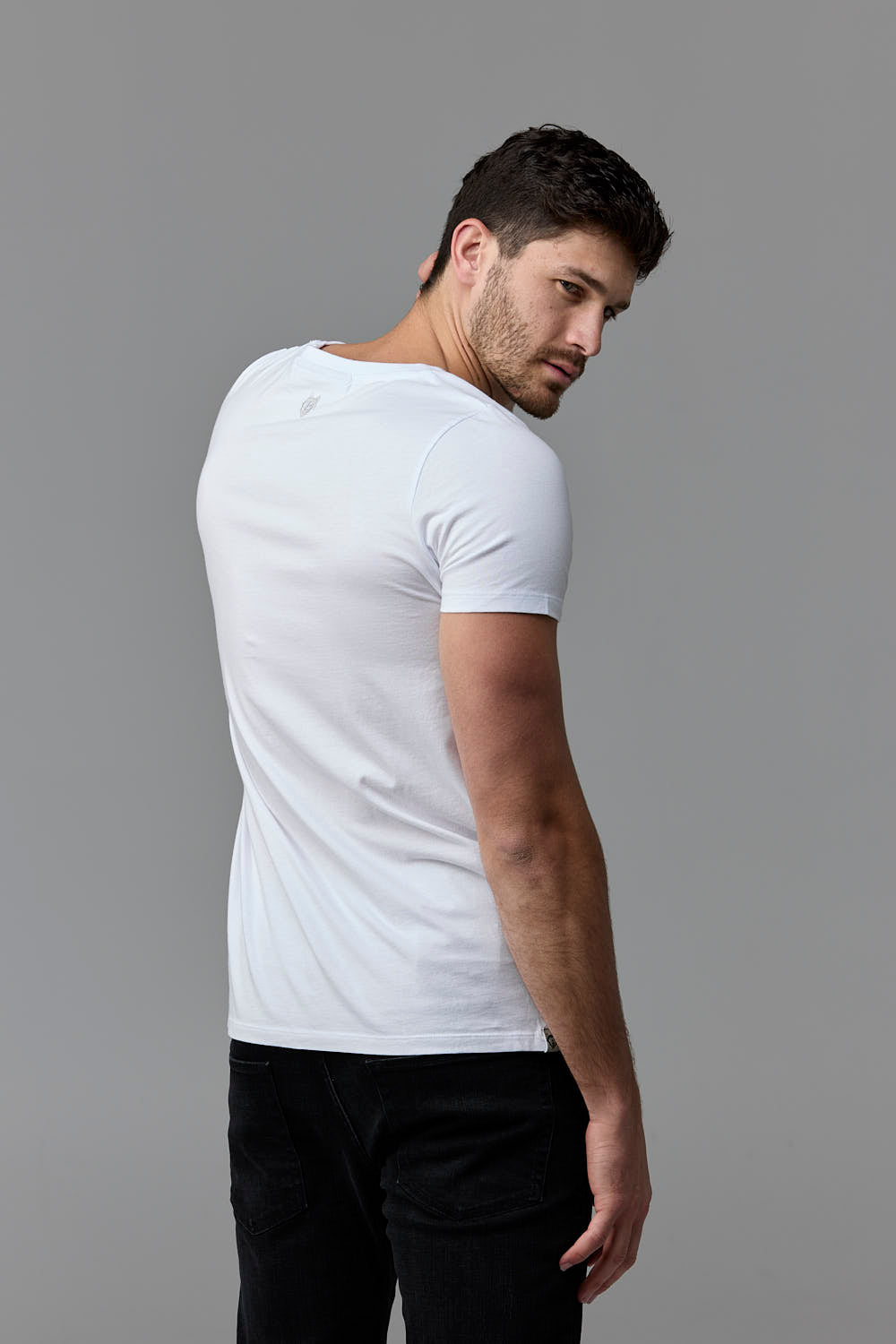 SOW ECOM - Man in white t-shirt & black pants