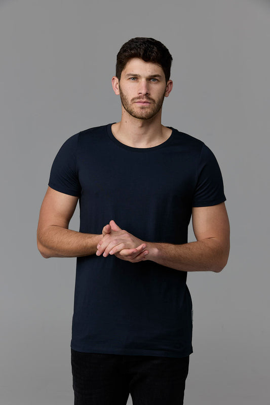 SOW ECOM - Man wearing navy crew neck t-shirt