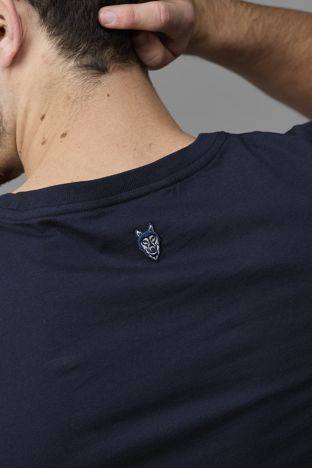 Navy t-shirt with wolf graphic on back