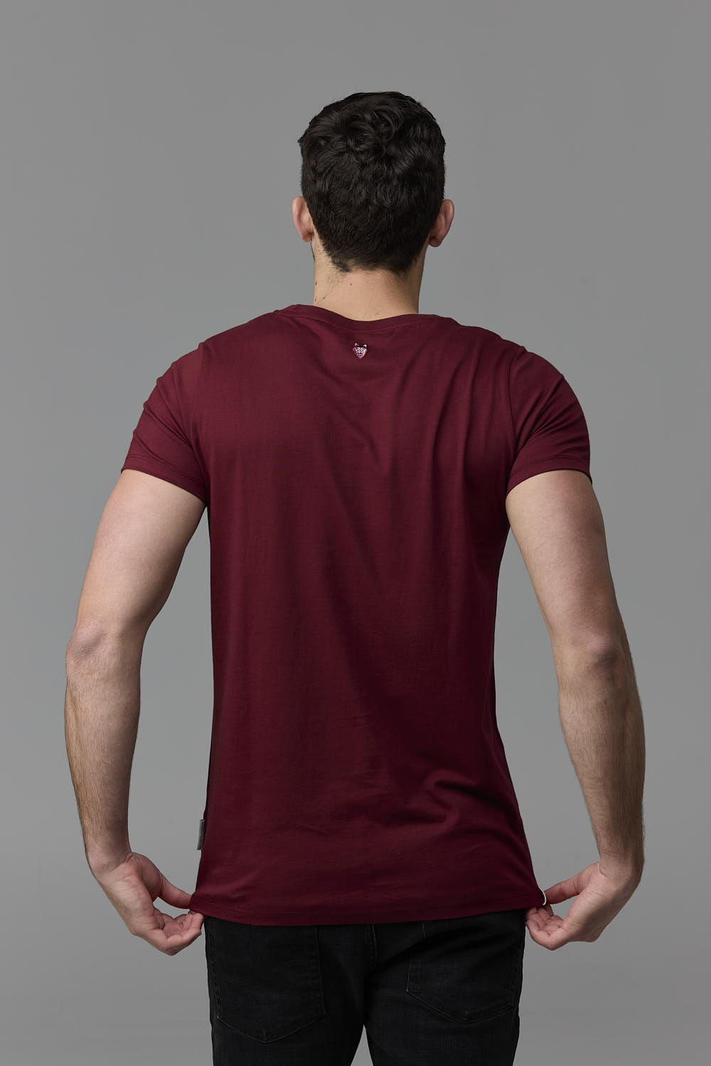 Man in maroon t-shirt