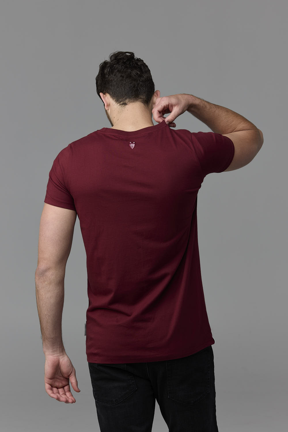 Man in burgundy t-shirt