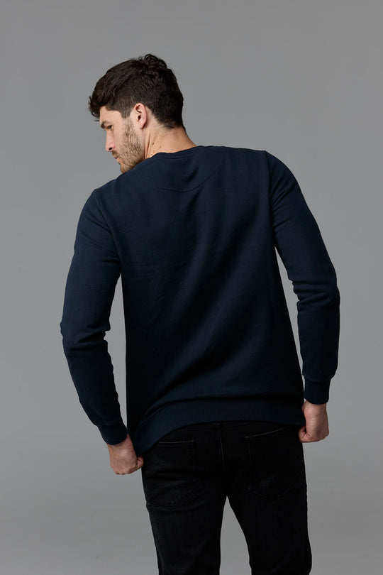 SOW ECOM - Man wearing navy sweatshirt