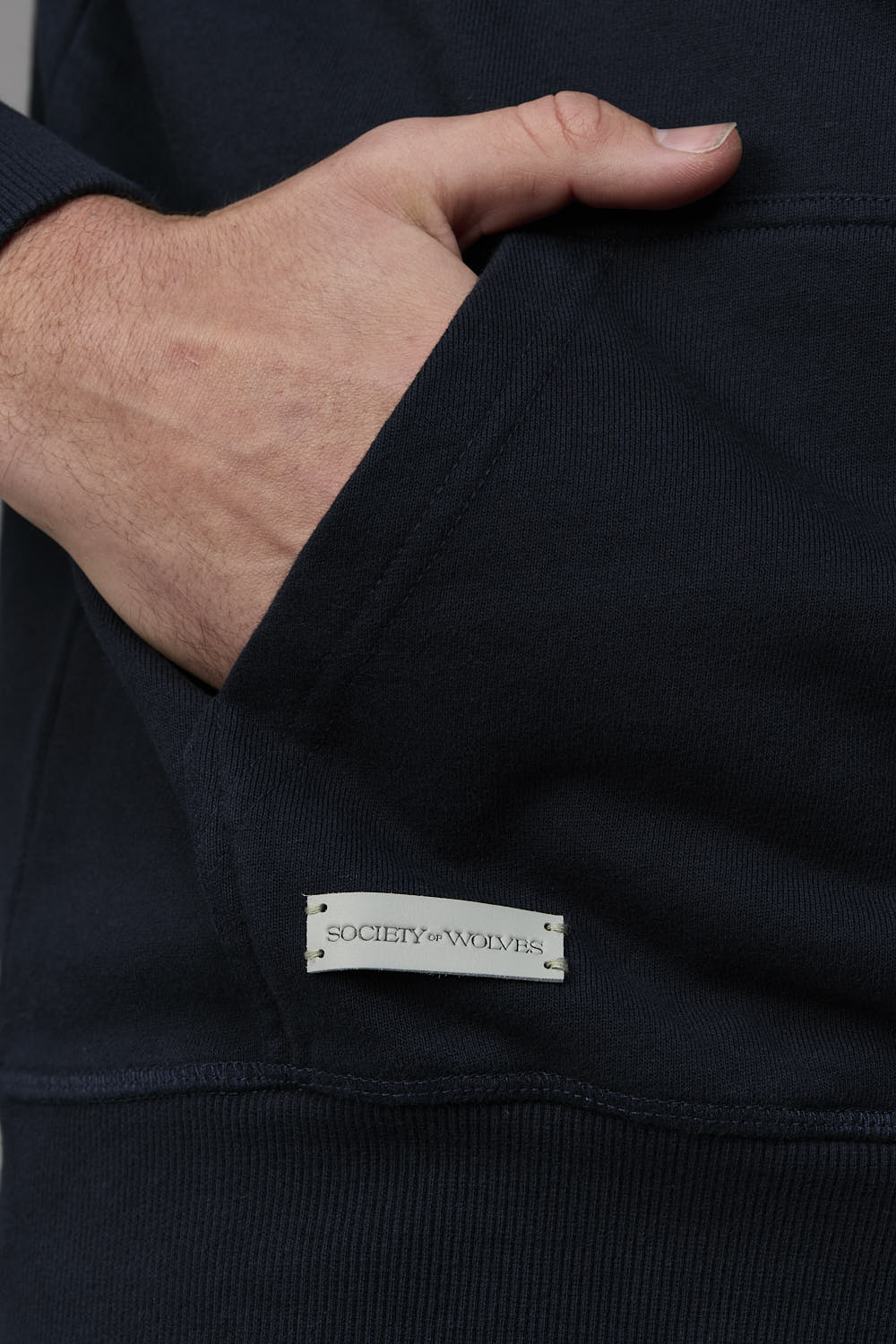 Society of Wolves hoodie pocket detail