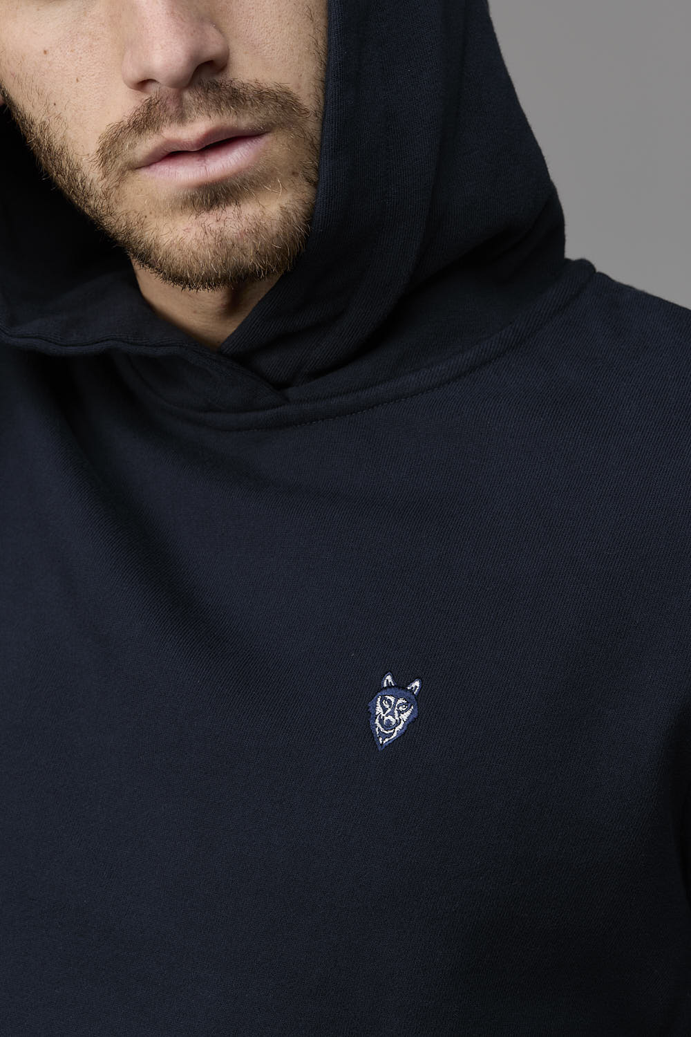 SOW ECOM Web - Man in black hoodie with logo