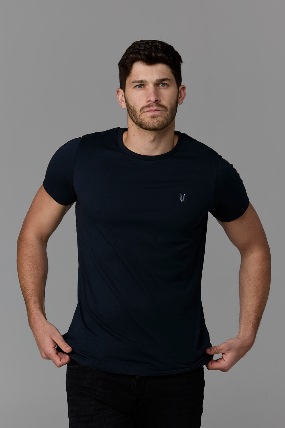 SOW ECOM - Man wearing navy tee shirt