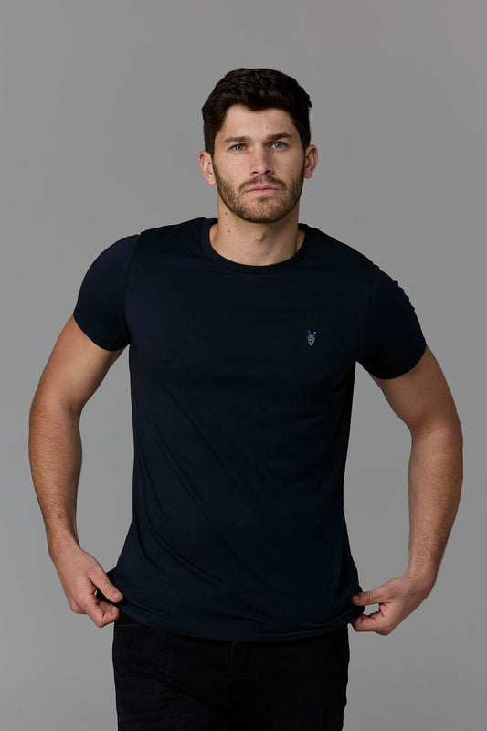 SOW ECOM - Man wearing navy tee shirt