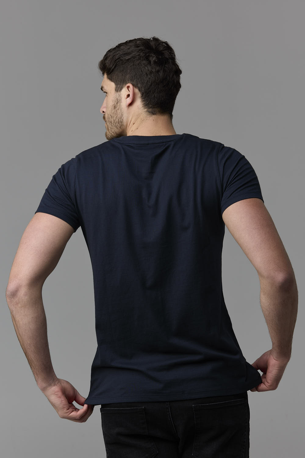 SOW Ecom Web 497 - Man in navy t-shirt from behind