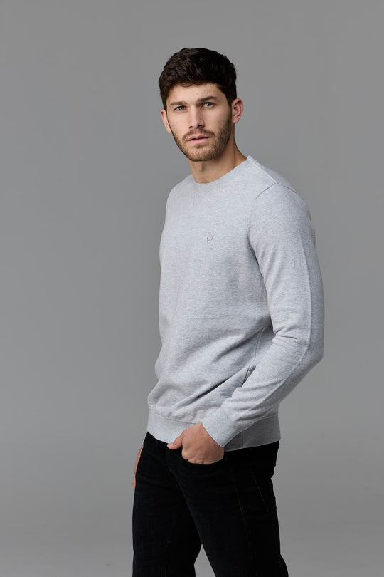 SOW ECOM - Man in light grey sweater & black pants