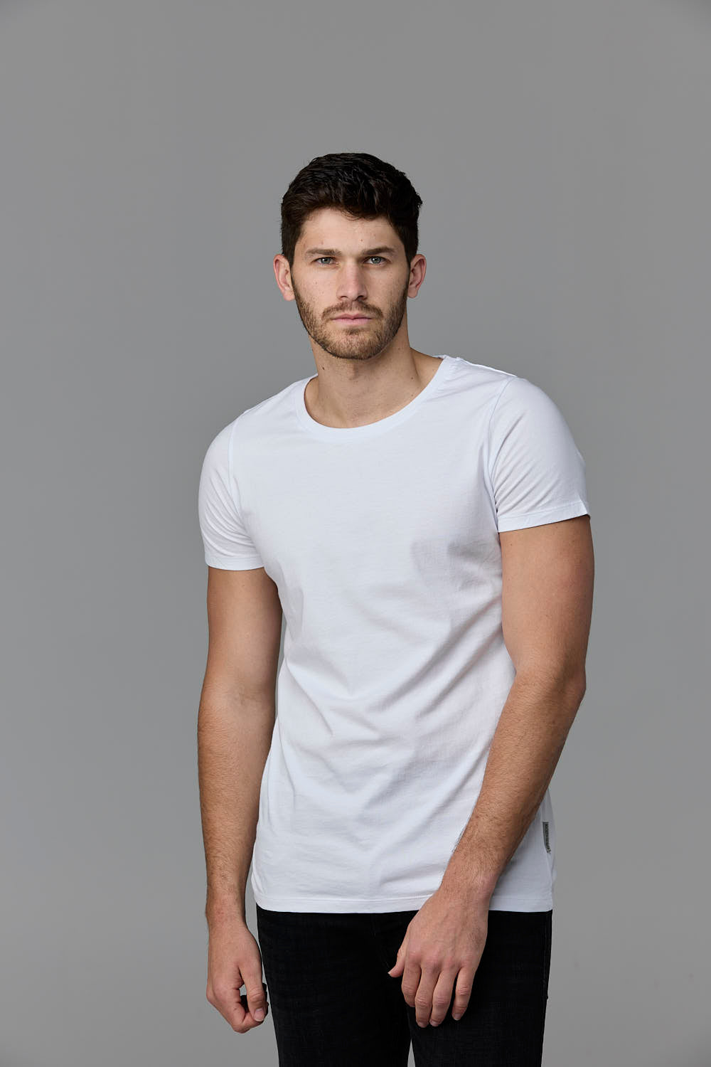 Man wearing white crew neck t-shirt - SOW ECOM WEB 84
