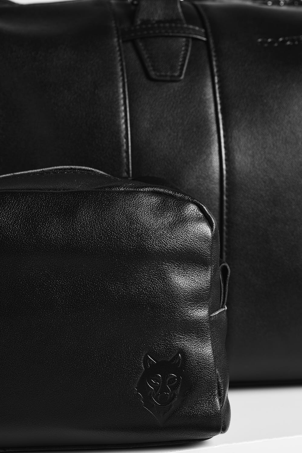 Black leather travel bags